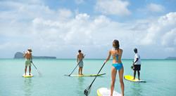 SUP - stand up paddle boarding at Anse Le Raie - Mauritius.